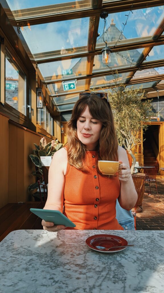 spring dresses reading with a kindle
